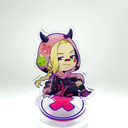 A clear acrylic tokyo revengers manjiro stand featuring a chibi blonde character in a pink hoodie with black horns