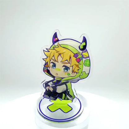 Clear acrylic tokyo revengers manjiro stand with blonde chibi character in green and purple outfit on circular base