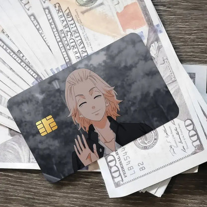 Black credit card featuring tokyo revengers mikey anime character with blonde hair on dark cloudy background for sticker cover