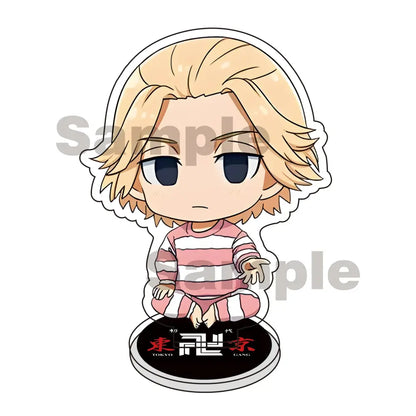Chibi-style tokyo revengers mikey draken acrylic stand keychain in pink and white striped pajamas sitting on circular base