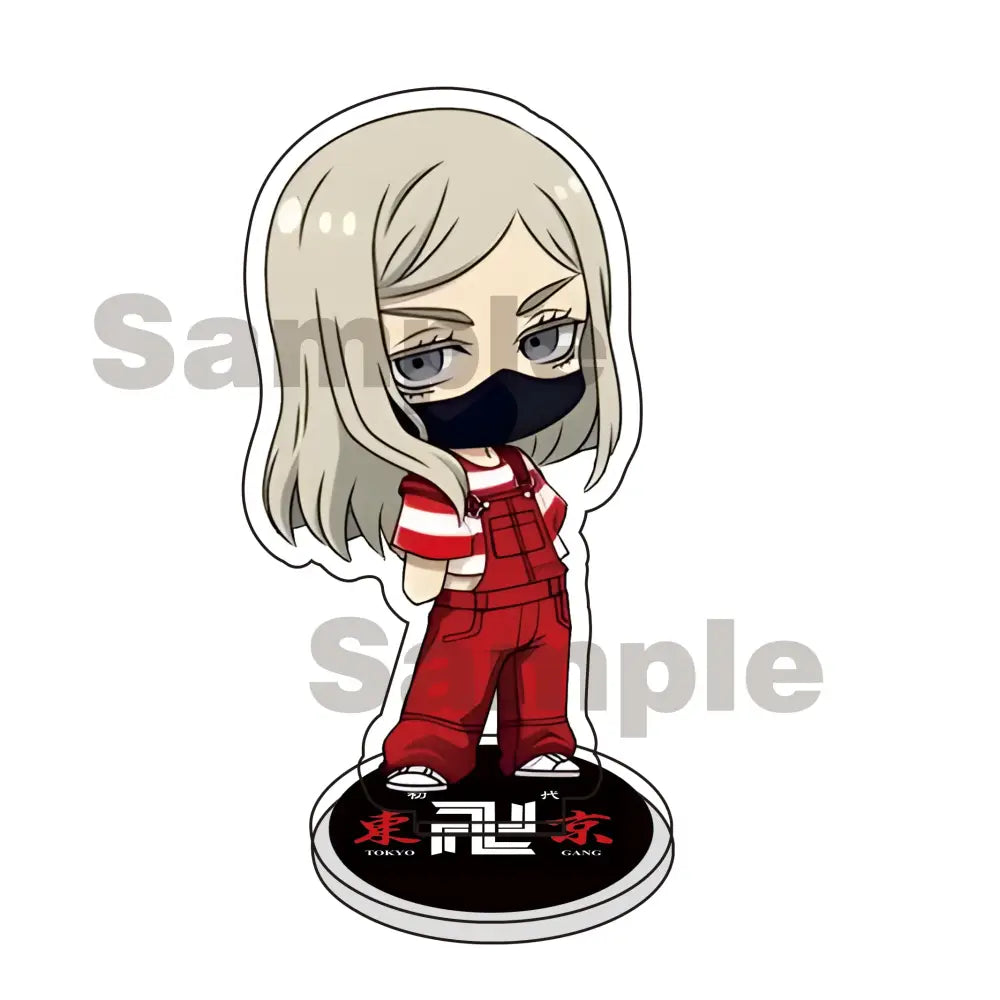 Chibi-style tokyo revengers akryl stand keychain of blonde character in red overalls and black mask on tokyo ghoul base