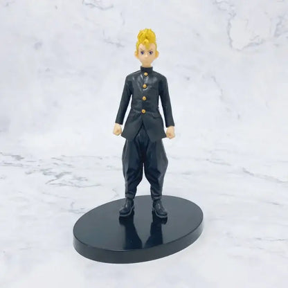 Black plastic figurine of mikey with spiky blonde hair in black uniform with gold buttons tokyo revengers pvc figure