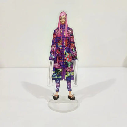 A vibrant translucent ran rindo haitani acrylic stand featuring pink hair and a purple floral coat from tokyo revengers