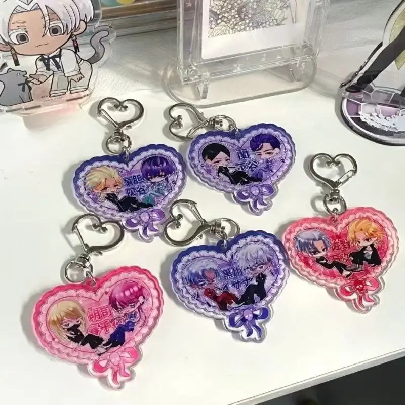 Tokyo Revengers sanzu heart-shaped acrylic keychain featuring chibi anime characters with colorful bows and metallic clasps