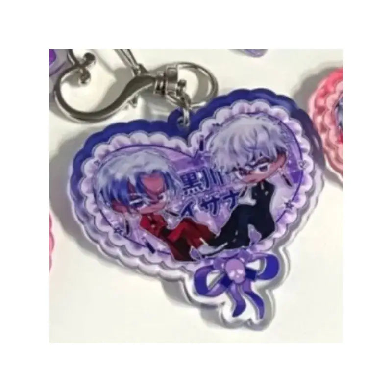 Purple heart-shaped acrylic keychain featuring two silver-haired anime characters from Tokyo Revengers with a decorative bow