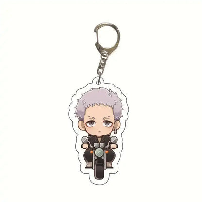 Silver-accented acrylic keychain of chibi takemichi draken riding a motorcycle in black attire from tokyo revengers