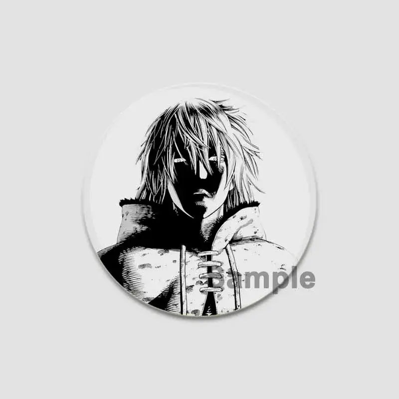 Black-and-white vinyl saga anime badge pin featuring a spiky-haired character in a hooded garment on tinplate plastic