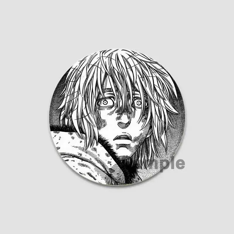 Circular black and white tinplate anime badge pin featuring detailed vinland saga character with expressive eyes and hair