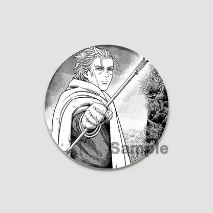 Black-and-white vinyl anime badge pin featuring detailed manga character with spiky hair holding a staff tinplate plastic