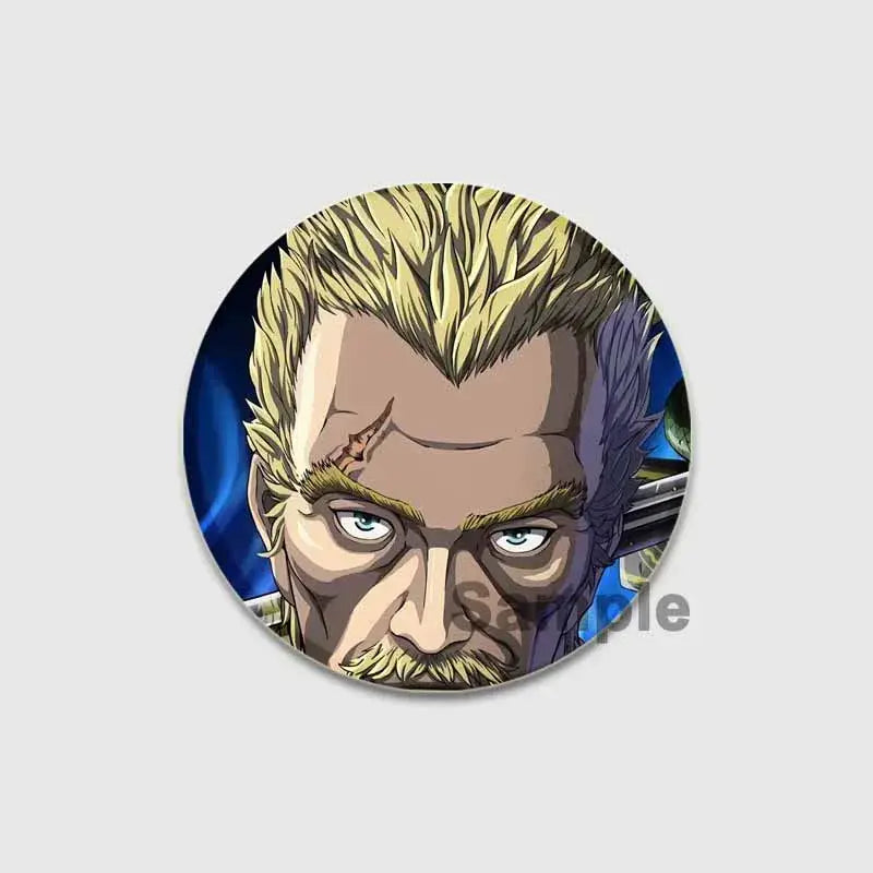 Circular vinland saga badge pin featuring a detailed anime portrait of a blonde man with green eyes on tinplate