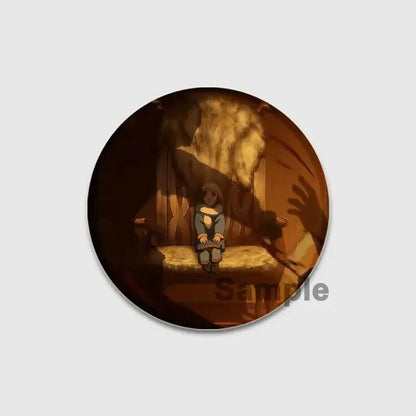 Circular vinland saga badge pin featuring a small figure on a stone bench in warm golden light handmade tinplate brooch