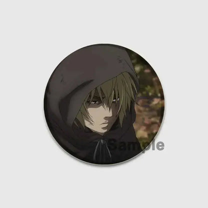 Circular vinland saga badge pin featuring grayscale anime character with light brown hair on handmade tinplate brooch