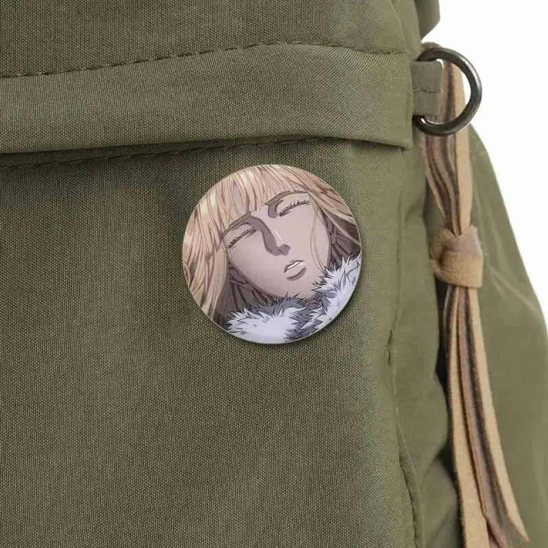 Circular vinland saga badge pin featuring handmade tinplate brooch with anime-style blonde character and white fur trim