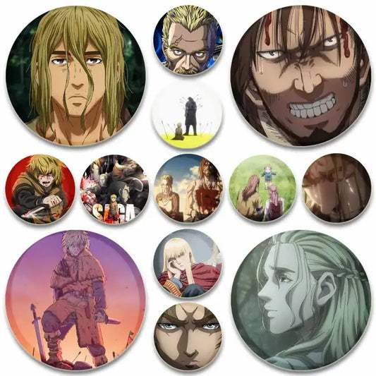 A collection of handmade tinplate vinland saga badge pins featuring circular designs with anime character expressions