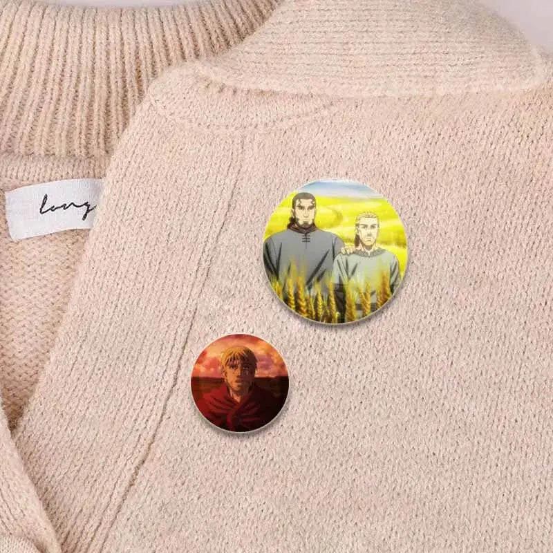 Vinland saga badge pin set of two handmade tinplate brooches featuring anime characters in golden field and sunset colors