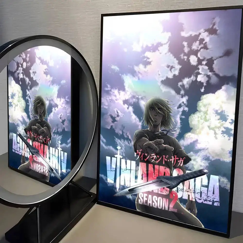 Framed vinland saga manga wall art poster with light-haired character holding sword on glossy paper backdrop