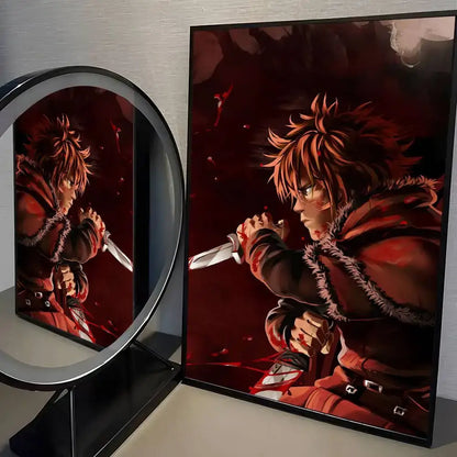 A framed vinland saga manga wall art poster with a spiky-haired character in red and black holding a bloodied knife