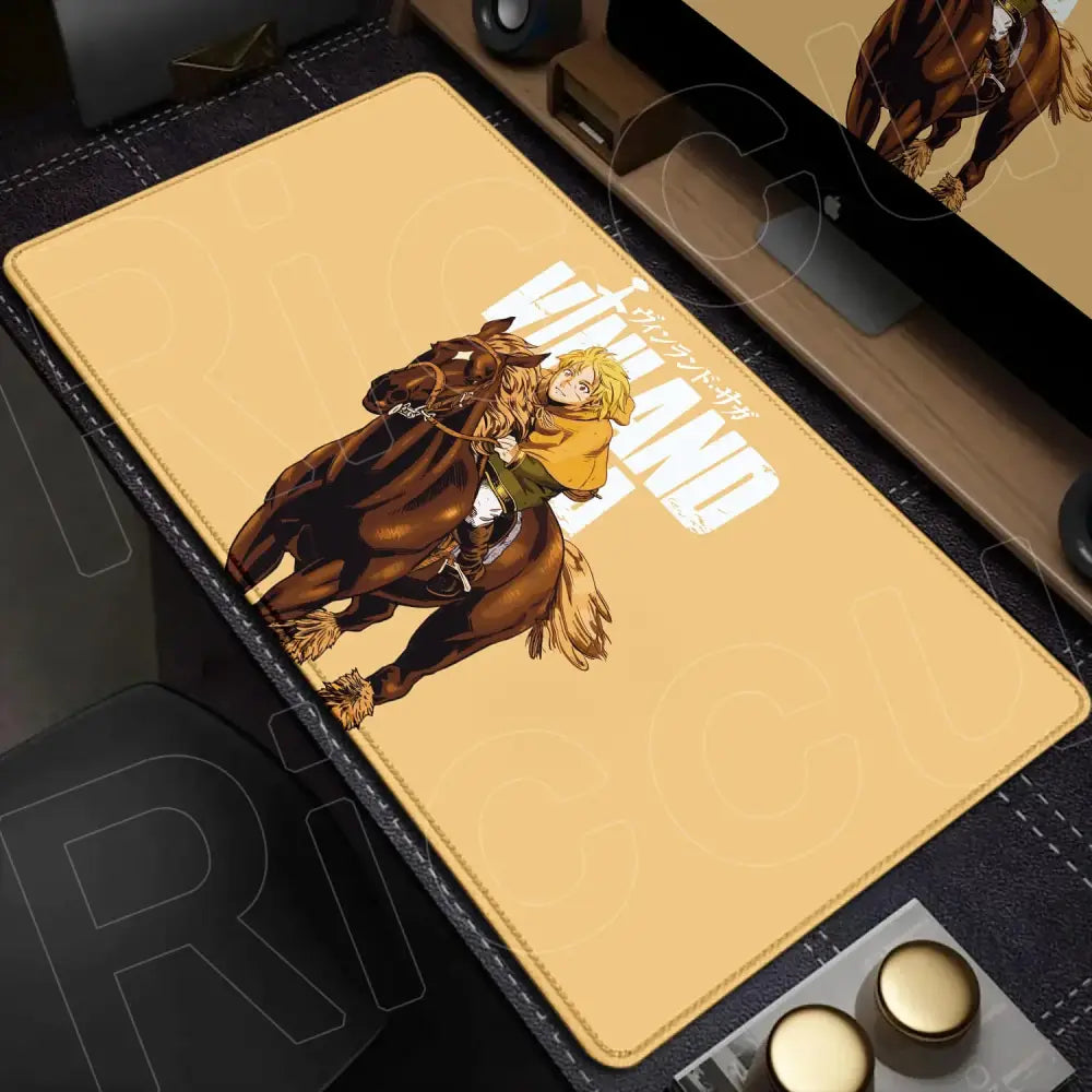 Beige rectangular vinland saga mouse pad with anime blonde character riding brown horse and white wind lettering desk mat