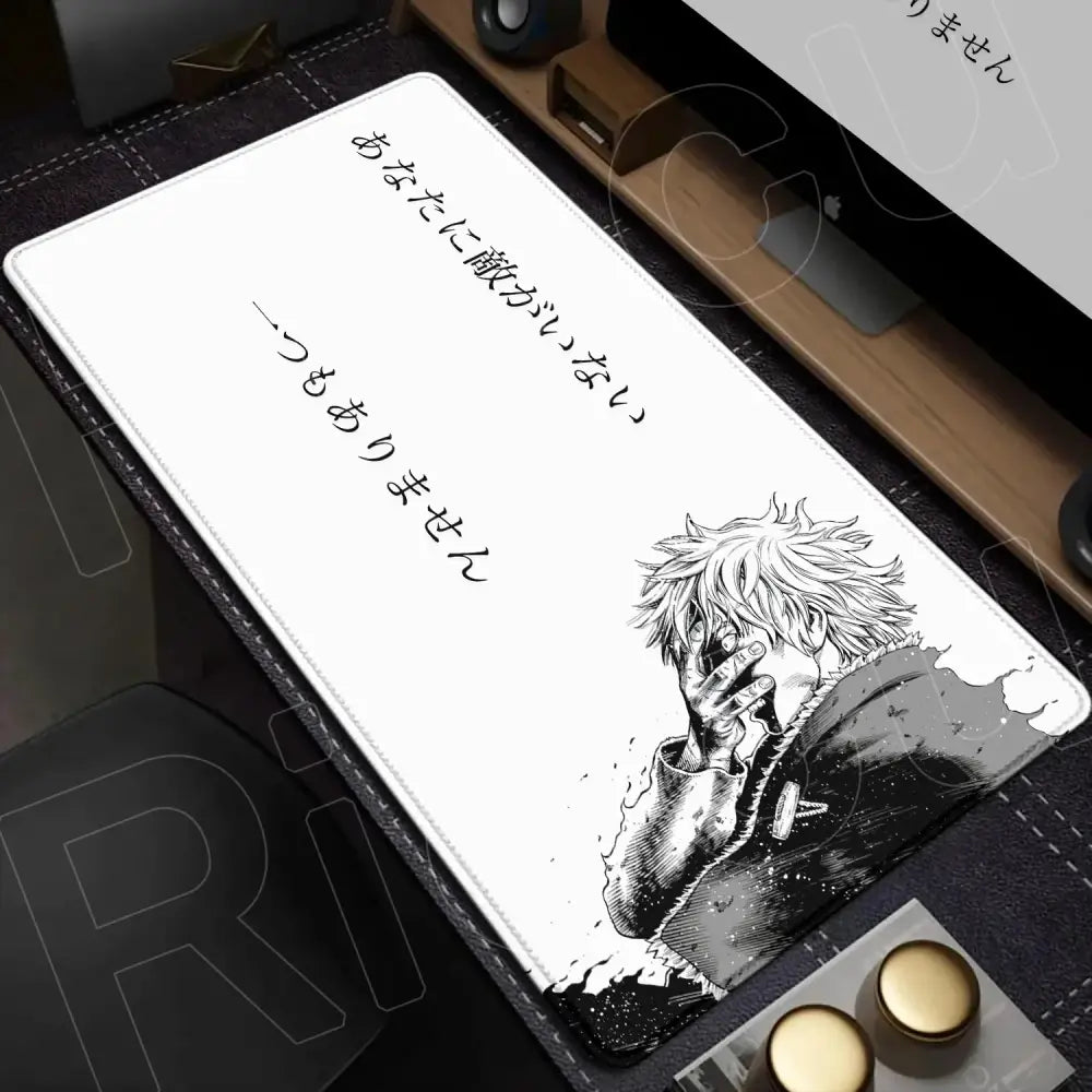 White rectangular vinyl desk mat featuring black-and-white vinland saga mouse pad anime character with spiky hair and japanese text