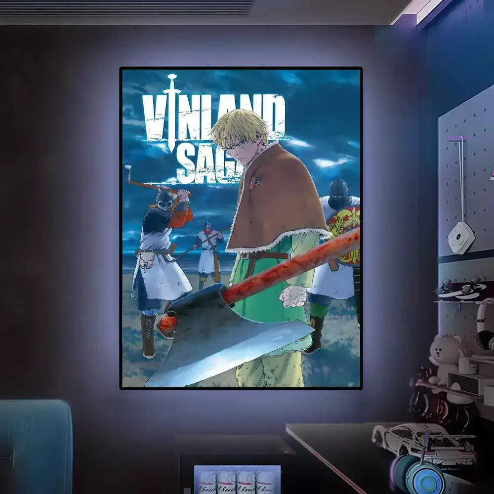 A framed vinland saga wall art poster featuring a blonde character in a brown cloak holding an axe with blue skies background