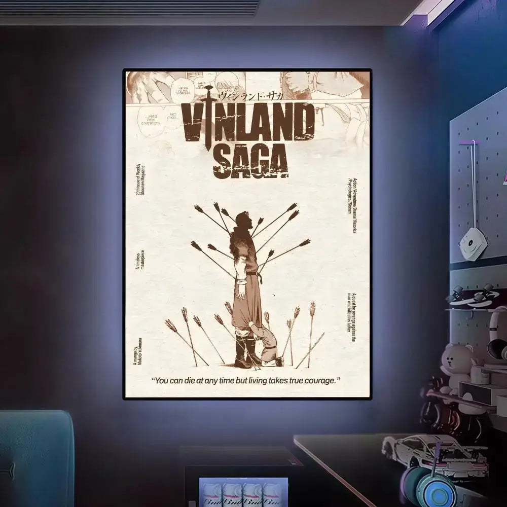 A framed vinland saga anime poster featuring sepia-toned wall art with bold black lettering and japanese text