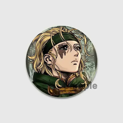 Circular vinland saga thorfinn button brooch featuring blonde character with green headband on tinplate soft badge