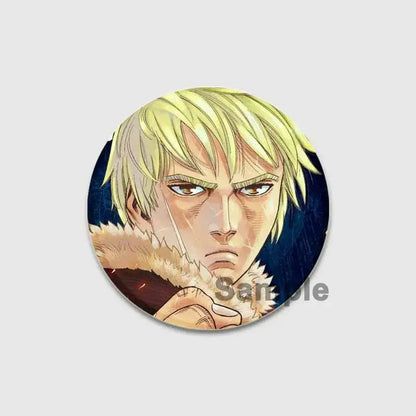 Circular tinplate saga thorfinn button featuring detailed anime illustration of blonde hair character with fur-lined collar