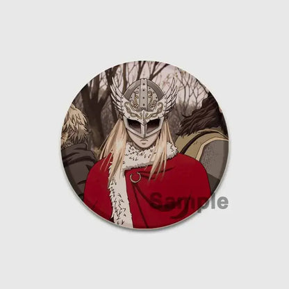 Circular tinplate soft badge featuring anime-style vinland saga thorfinn with silver winged helmet and red fur-trimmed cloak