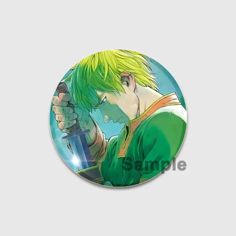 Circular tinplate soft badge featuring vinland saga thorfinn in green tunic holding sword against blue background