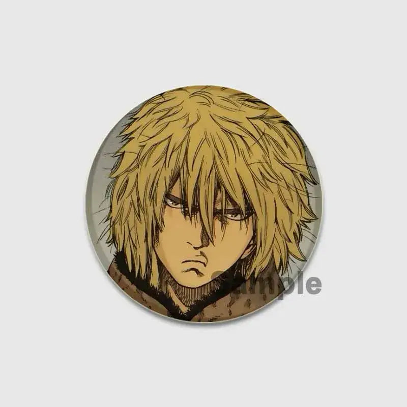 Circular vinland saga thorfinn button brooch with spiky blonde hair anime character on glossy tinplate surface