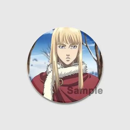Circular vinland saga thorfinn enamel pin featuring anime character with long blonde hair and red fur trimmed cloak