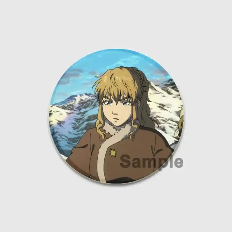 Circular vinland saga thorfinn enamel pin featuring blonde anime character in brown coat with snowy mountain background