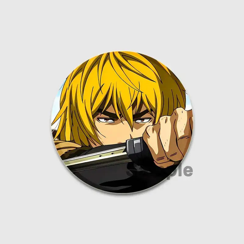 Vinland saga thorfinn enamel pin with vibrant yellow hair and intense eyes gripping sword hilt in detailed illustration