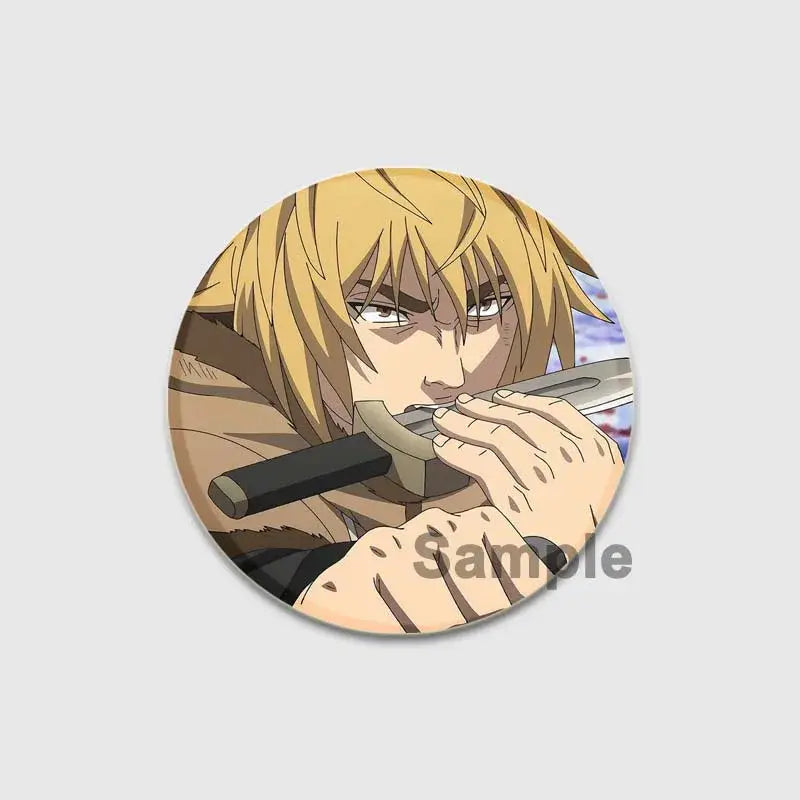Vinland saga thorfinn enamel pin featuring a blonde male with intense eyes holding a sword hilt on glossy plastic