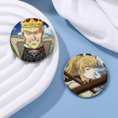 Circular vinland saga thorfinn enamel pin and blonde warrior pin with detailed artwork on smooth glossy surfaces handcrafted