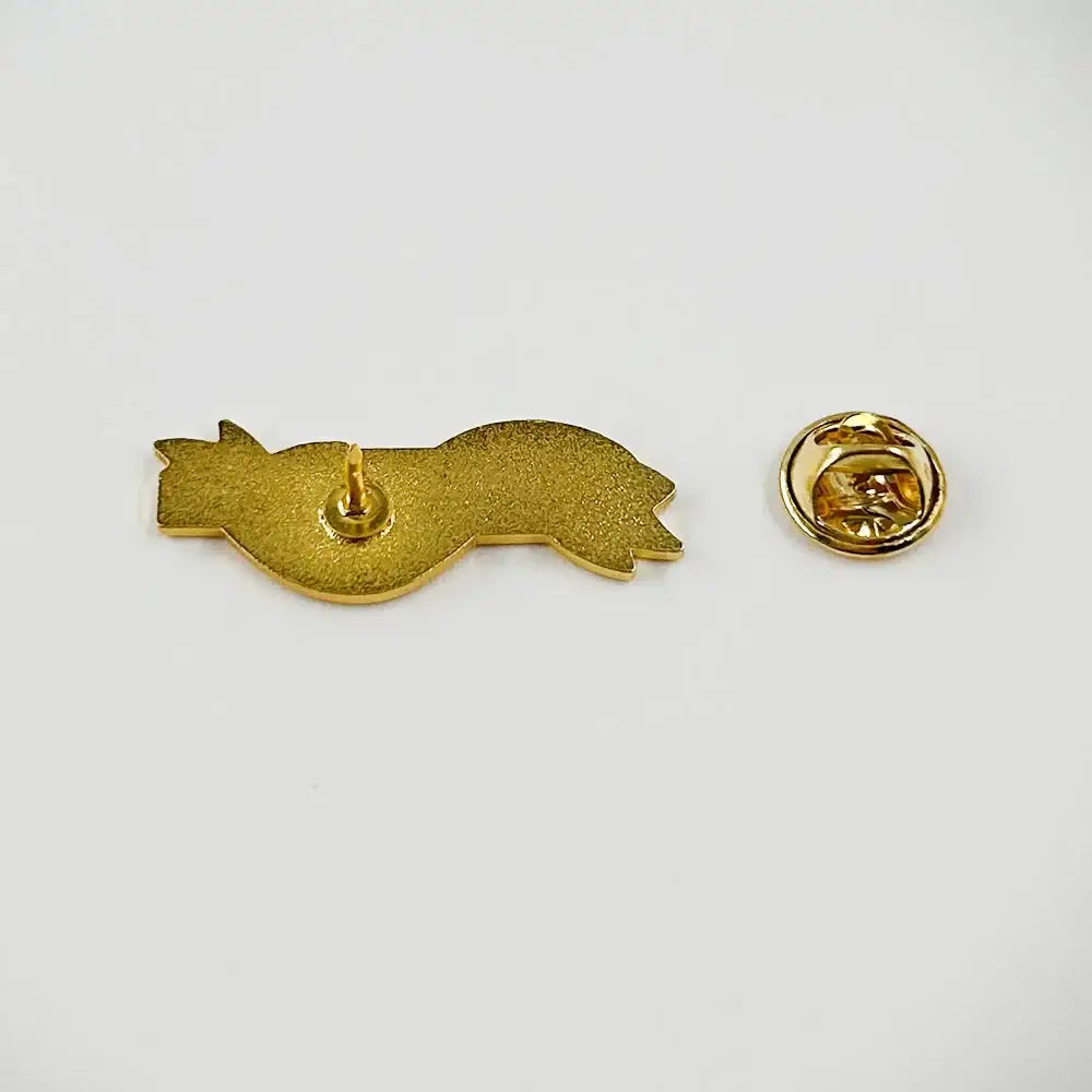 Gold-colored metal vinland saga thorfinn enamel pin shaped like a stylized cat shortsword badge