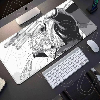 Black-and-white vinland saga thorfinn gaming mouse pad with dynamic spiky-haired character and multiple hands on white background