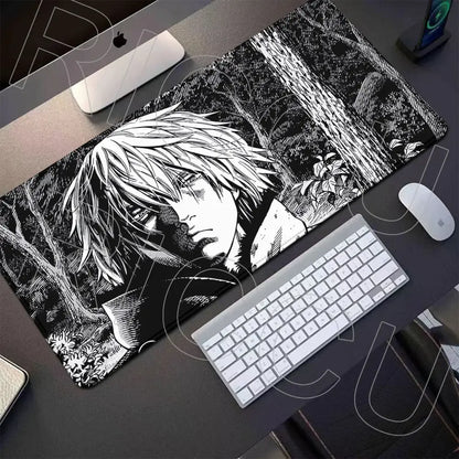 Vinland saga thorfinn gaming mouse pad in black and white with detailed character illustration and forest backdrop 800x400mm