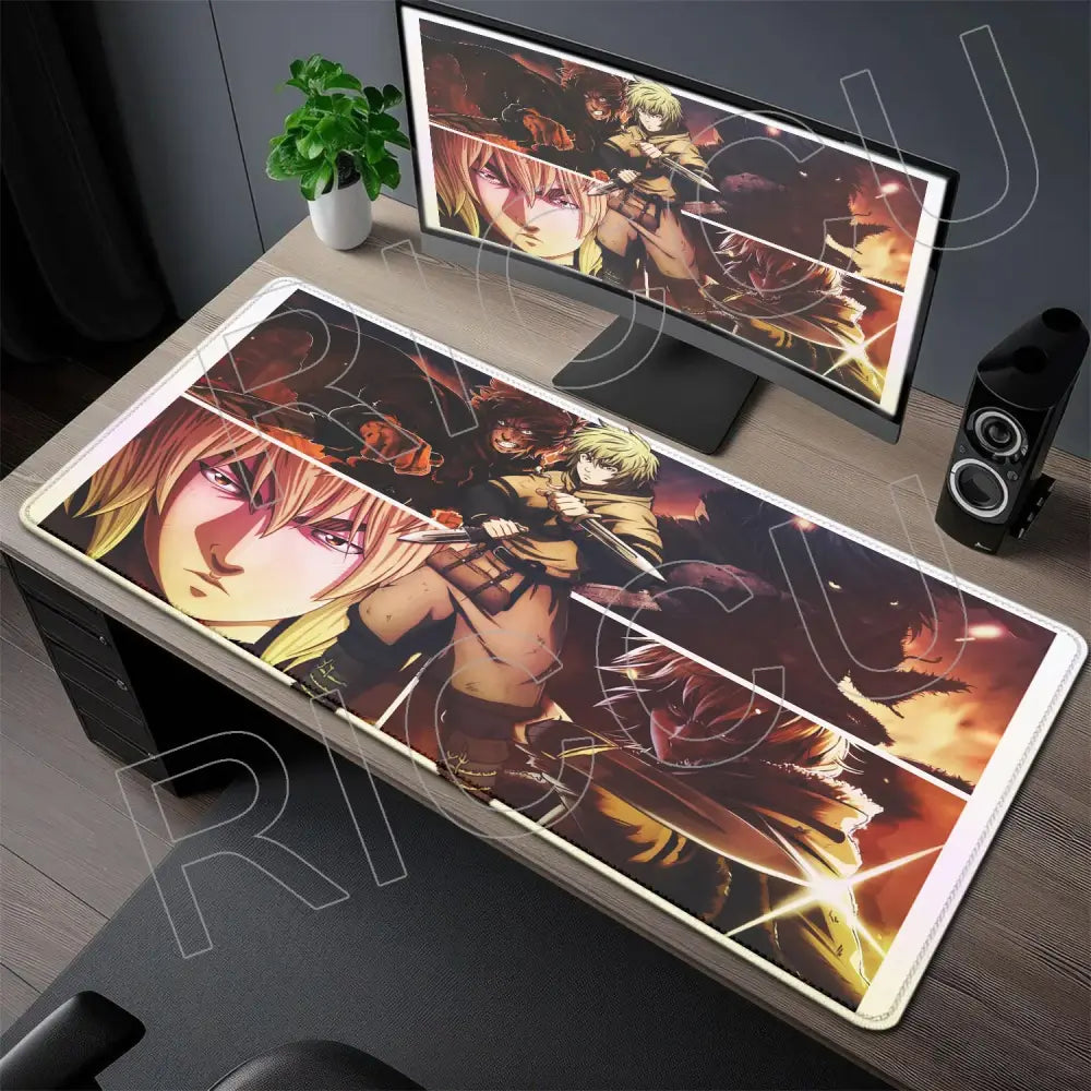 Long rectangular vinland saga thorfinn gaming mouse pad with vibrant golden orange anime artwork on smooth surface