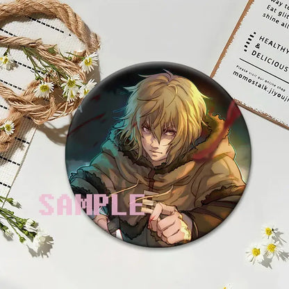 Vinland saga thorfinn lapel pin featuring a blonde character in a brown fur-lined coat with glossy finish circular design