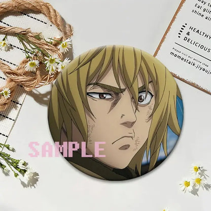 Circular glossy vinland saga thorfinn lapel pin featuring an anime character with blonde hair and brown eyes