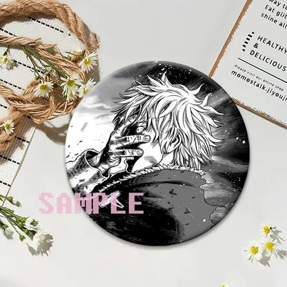 Black and white circular vinland saga thorfinn lapel pin featuring spiky hair character against starry background