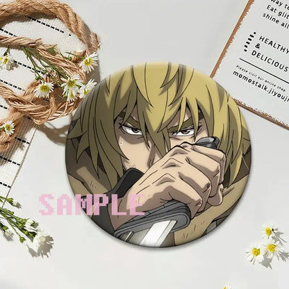 Vinland saga thorfinn round snap-in brooch showing blonde anime character gripping sword printed on glossy plastic pin