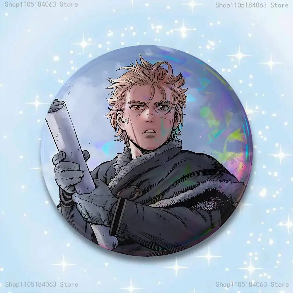 Circular vinland saga thorfinn pin badge featuring an illustrated character with spiky blonde hair holding a scroll