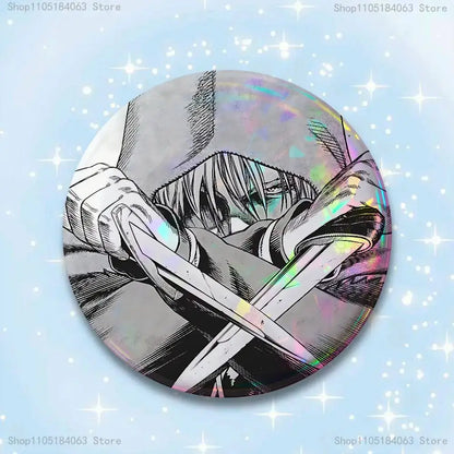 Circular vinland saga thorfinn pin badge featuring a black-and-white anime character with holographic detail