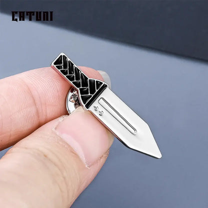 Silver and black enamel vinland saga thorfinn pin brooch shaped like a knife with textured grip design