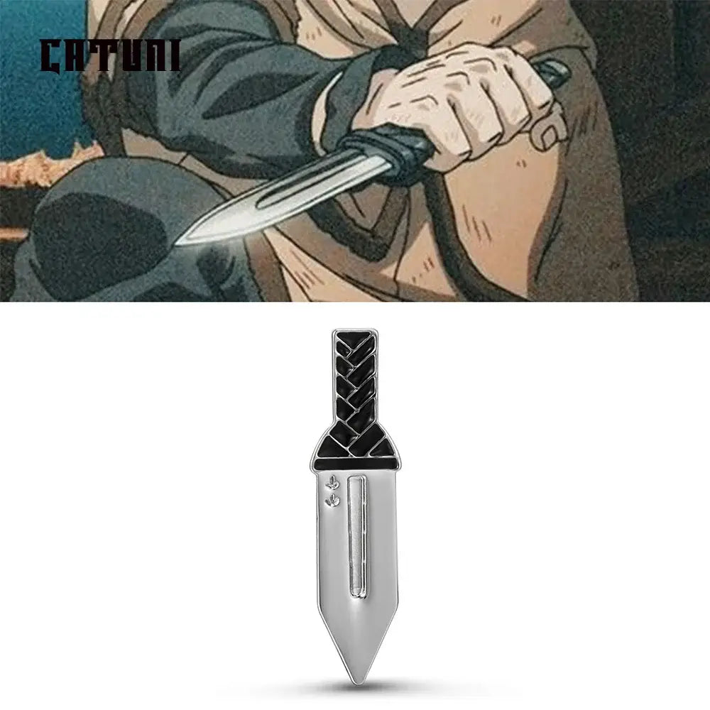 Silver dagger-shaped vinland saga thorfinn pin with black braided handle and metallic blade lapel badge