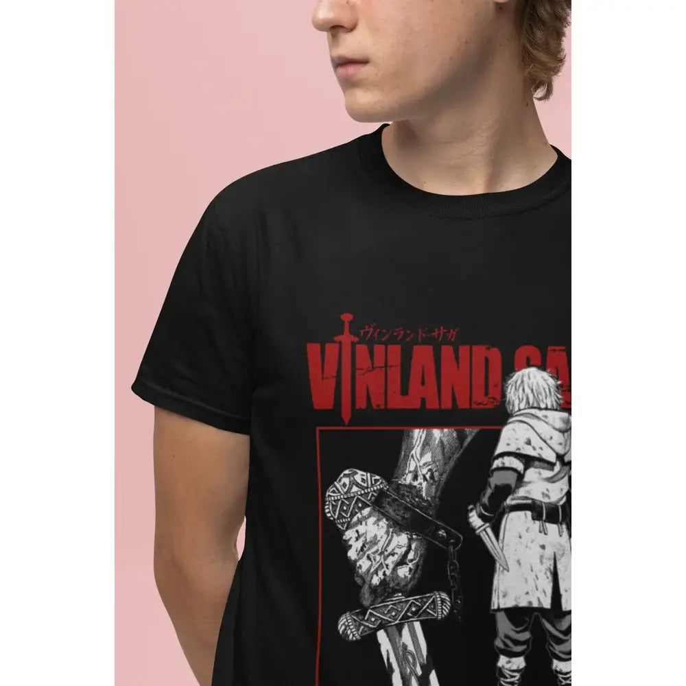 Black cotton tee featuring bold red and white vinland saga graphic with stylized title and thorfinn holding a sword