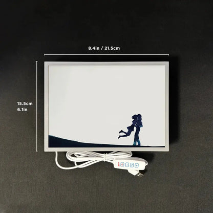 White rectangular led night light featuring dark blue anime-style silhouette embracing figures wall art glowing design