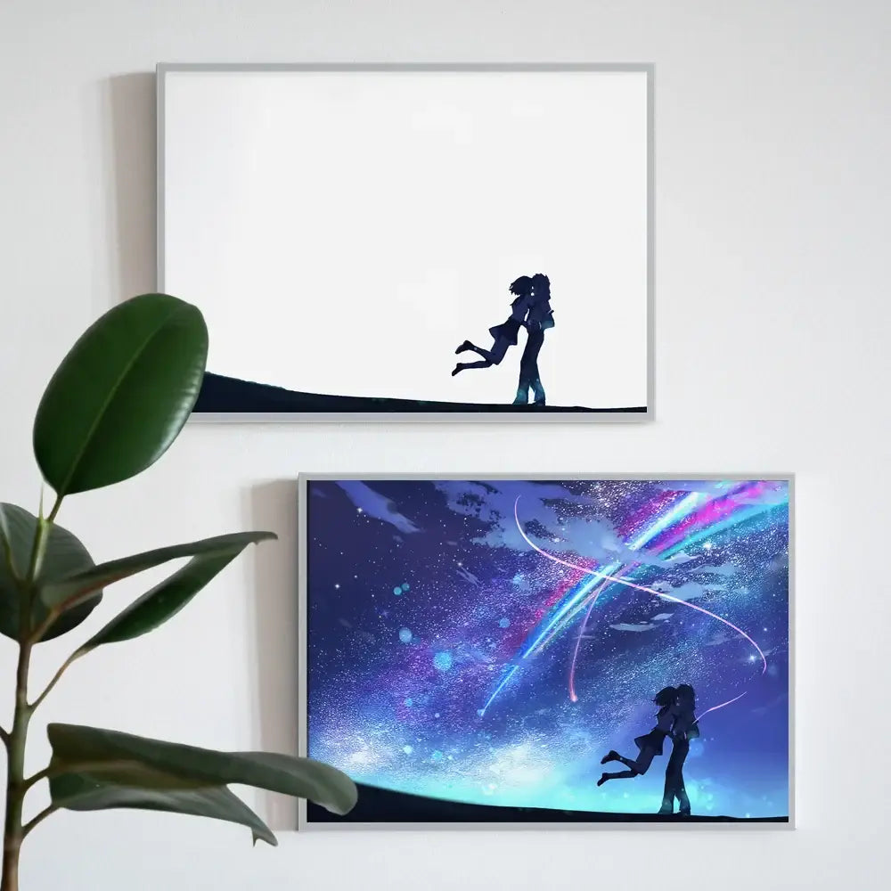 Two framed led night light wall art pieces featuring black silhouettes and vibrant cosmic colors on a white wall
